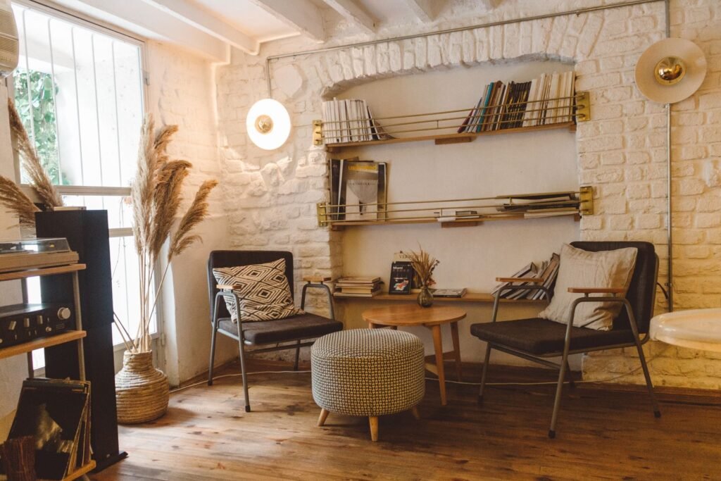 Armchairs and ottoman in a rustic living room (illustrative stock image)