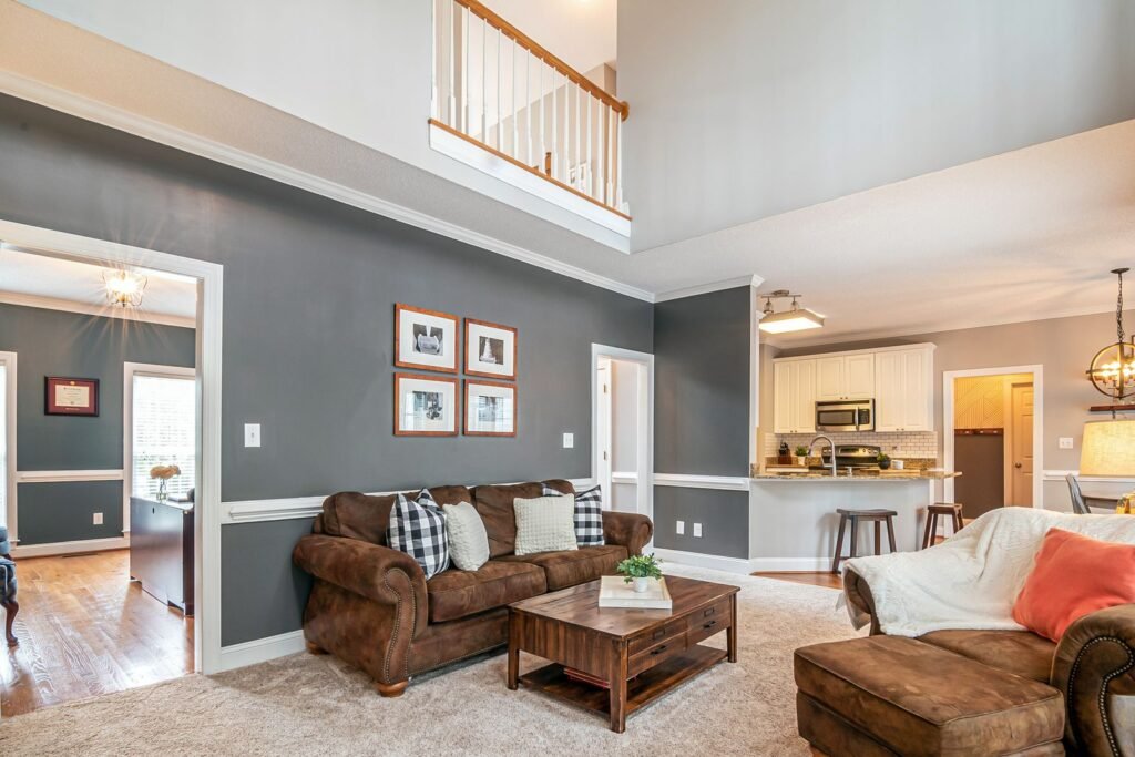 Brown sofas and coffee table in an open-plan room (illustrative stock image)