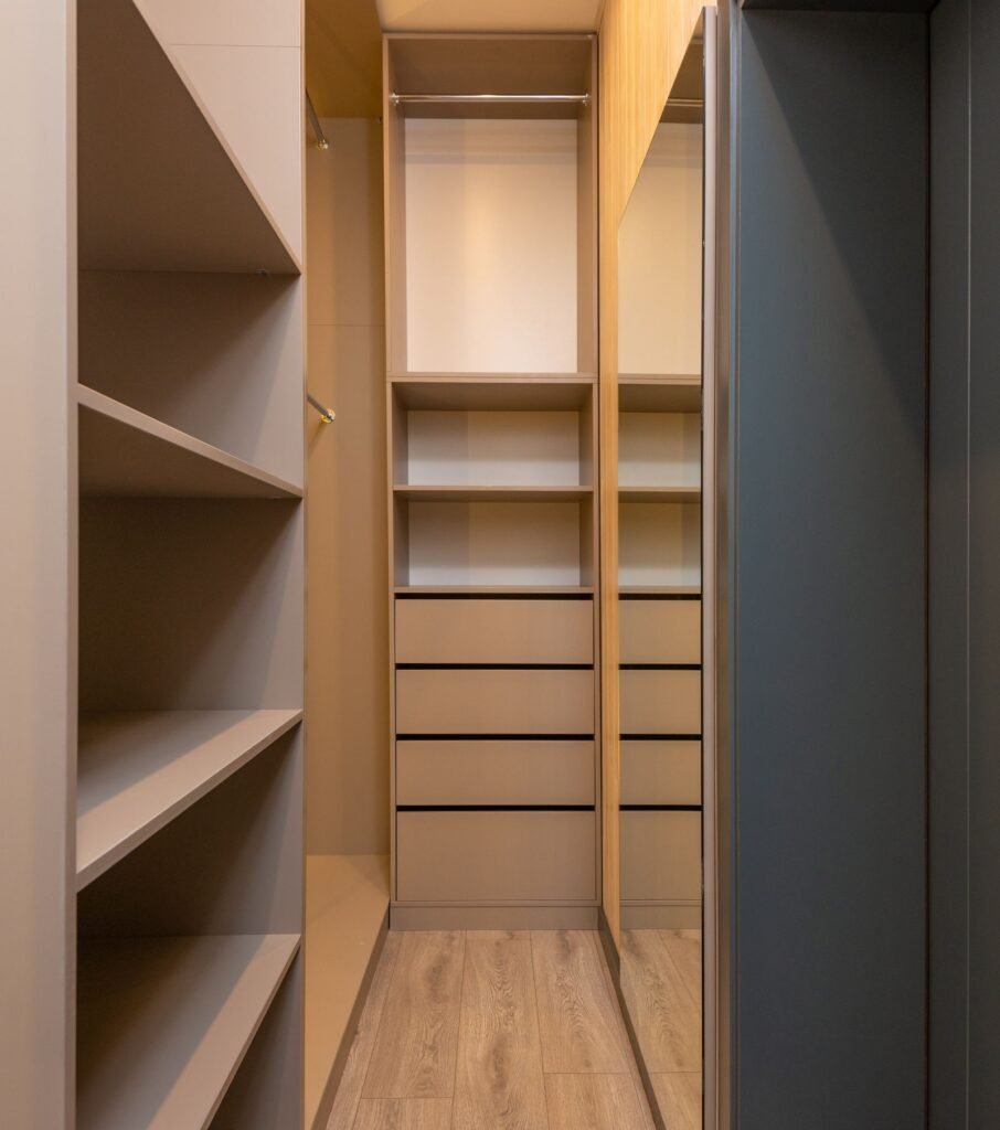 Built-in closet with racks and shelves (illustrative stock image)
