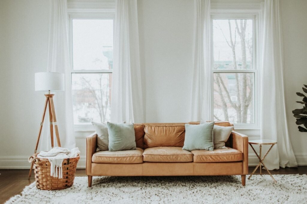 Leather sofa in a bright living room (illustrative stock image)
