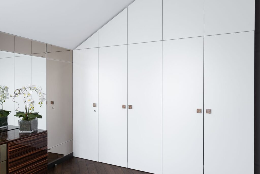 White wardrobe in a spacious room (illustrative stock image)
