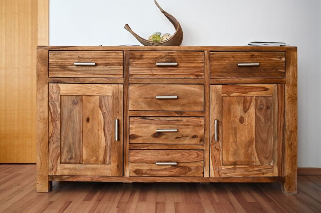 Wooden storage cabinet with drawers (illustrative stock image)