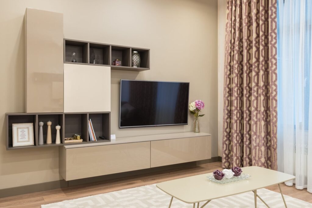 Living room wall unit with open shelves, closed cabinets and a floating TV console (illustrative stock image)